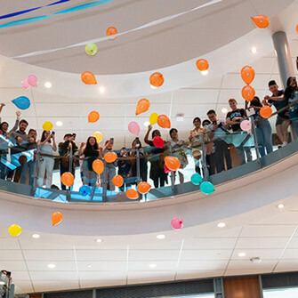 Balloons are tossed in the Armstrong Building for Match Day.
